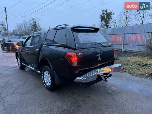 Черный Мицубиси Л 200, объемом двигателя 2.5 л и пробегом 199 тыс. км за 11800 $, фото 9 на Automoto.ua