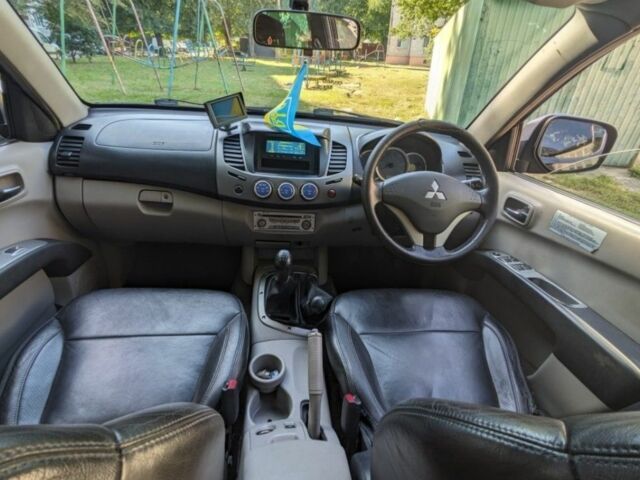 Мицубиси Л 200 2007 в Ровно на Automoto.ua Черный Мицубиси Л 200, объемом двигателя 2.5 л и пробегом 220 тыс. км за 5832 $, фото 2 на Automoto.ua