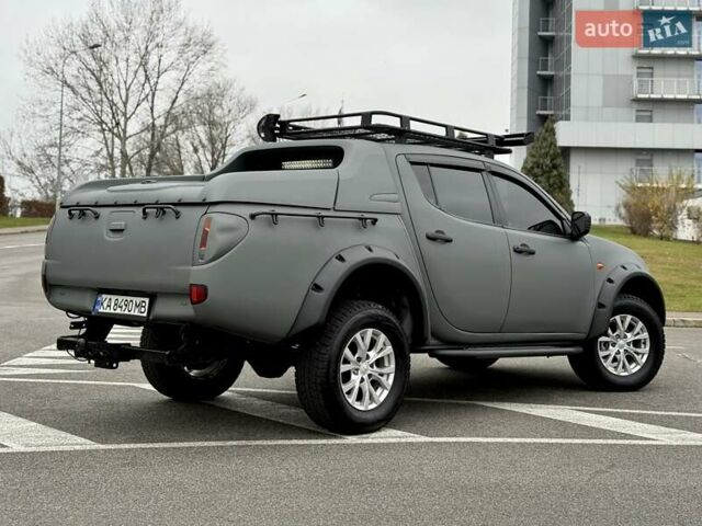 Черный Мицубиси Л 200, объемом двигателя 2.48 л и пробегом 232 тыс. км за 13900 $, фото 16 на Automoto.ua