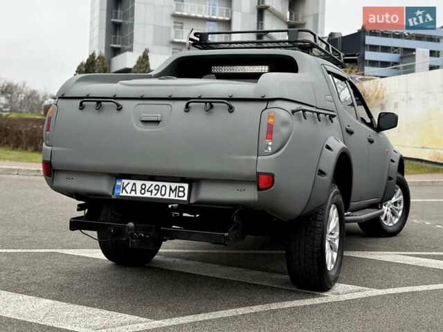 Черный Мицубиси Л 200, объемом двигателя 2.48 л и пробегом 232 тыс. км за 13900 $, фото 13 на Automoto.ua