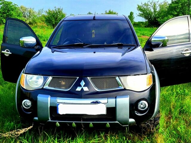 Чорний Міцубісі Л 200, об'ємом двигуна 2.5 л та пробігом 200 тис. км за 7500 $, фото 1 на Automoto.ua