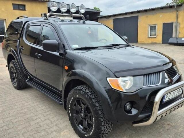 Черный Мицубиси Л 200, объемом двигателя 2.5 л и пробегом 278 тыс. км за 4200 $, фото 1 на Automoto.ua