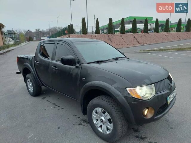 Чорний Міцубісі Л 200, об'ємом двигуна 2.48 л та пробігом 290 тис. км за 9900 $, фото 1 на Automoto.ua