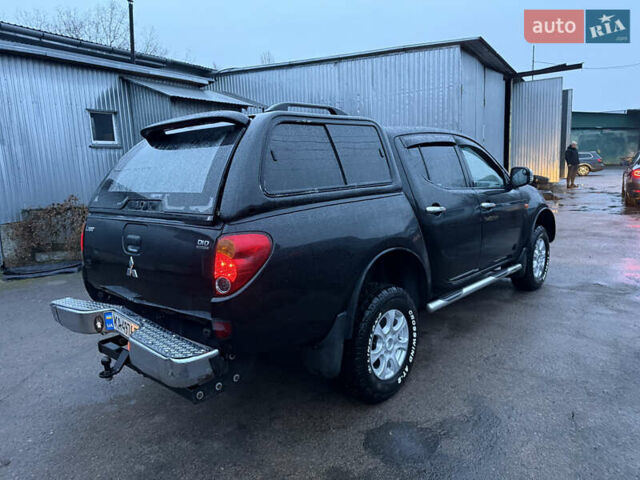 Черный Мицубиси Л 200, объемом двигателя 2.5 л и пробегом 199 тыс. км за 11800 $, фото 8 на Automoto.ua
