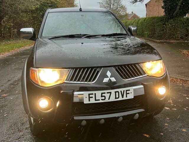 Черный Мицубиси Л 200, объемом двигателя 2.5 л и пробегом 190 тыс. км за 6655 $, фото 3 на Automoto.ua