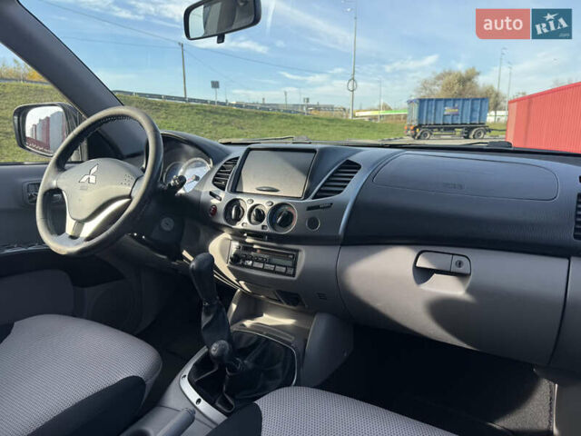 Мицубиси Л 200 2007 в Киеве на Automoto.ua Черный Мицубиси Л 200, объемом двигателя 2.48 л и пробегом 283 тыс. км за 10999 $, фото 17 на Automoto.ua