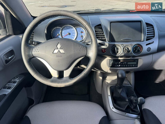 Мицубиси Л 200 2007 в Киеве на Automoto.ua Черный Мицубиси Л 200, объемом двигателя 2.48 л и пробегом 283 тыс. км за 10999 $, фото 28 на Automoto.ua