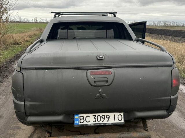 Чорний Міцубісі Л 200, об'ємом двигуна 2.5 л та пробігом 500 тис. км за 9300 $, фото 5 на Automoto.ua
