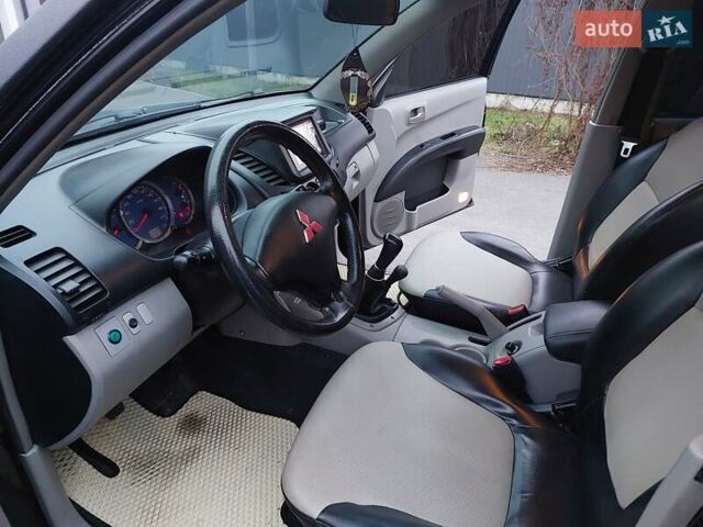 Чорний Міцубісі Л 200, об'ємом двигуна 2.48 л та пробігом 290 тис. км за 9900 $, фото 6 на Automoto.ua