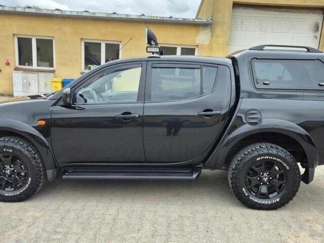 Черный Мицубиси Л 200, объемом двигателя 2.5 л и пробегом 278 тыс. км за 4200 $, фото 2 на Automoto.ua