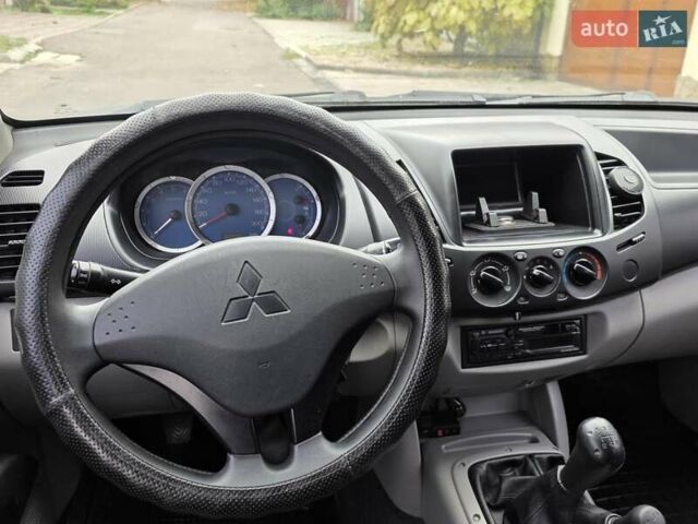 Мицубиси Л 200 2007 в Одессе на Automoto.ua Черный Мицубиси Л 200, объемом двигателя 2.48 л и пробегом 186 тыс. км за 12200 $, фото 12 на Automoto.ua