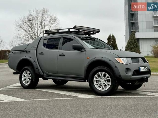 Черный Мицубиси Л 200, объемом двигателя 2.48 л и пробегом 232 тыс. км за 13900 $, фото 19 на Automoto.ua