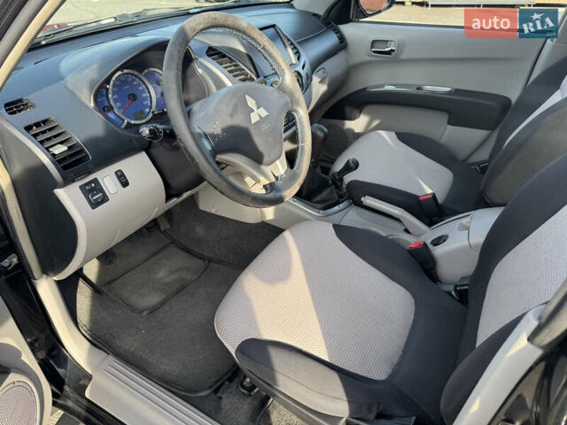 Мицубиси Л 200 2007 в Киеве на Automoto.ua Черный Мицубиси Л 200, объемом двигателя 2.48 л и пробегом 283 тыс. км за 10999 $, фото 21 на Automoto.ua