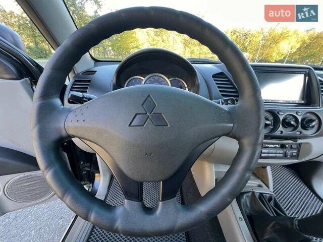 Міцубісі Л 200 2007 у Одесі на Automoto.ua Чорний Міцубісі Л 200, об'ємом двигуна 2.5 л та пробігом 83 тис. км за 15200 $, фото 12 на Automoto.ua