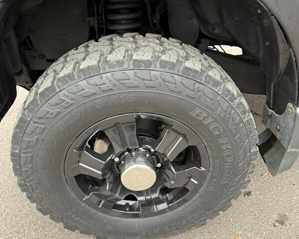 Черный Мицубиси Л 200, объемом двигателя 2.5 л и пробегом 152 тыс. км за 11800 $, фото 12 на Automoto.ua