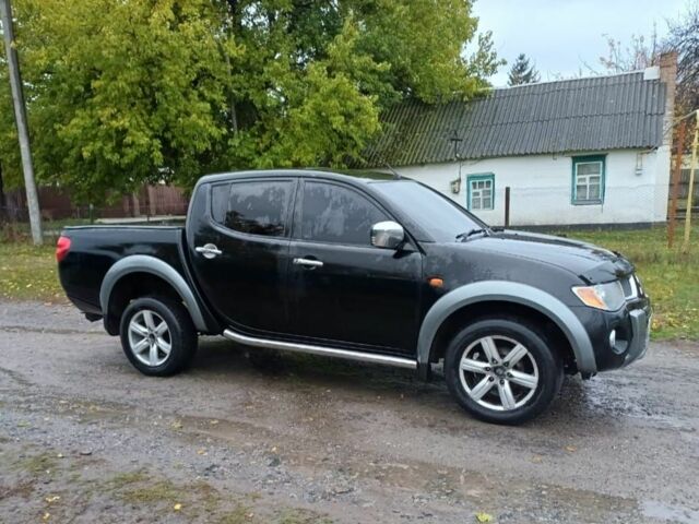 Черный Мицубиси Л 200, объемом двигателя 2.5 л и пробегом 170 тыс. км за 5900 $, фото 5 на Automoto.ua