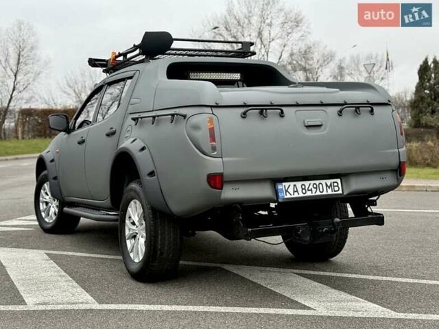 Черный Мицубиси Л 200, объемом двигателя 2.48 л и пробегом 232 тыс. км за 13900 $, фото 11 на Automoto.ua