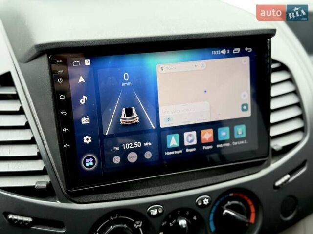 Черный Мицубиси Л 200, объемом двигателя 2.48 л и пробегом 232 тыс. км за 13900 $, фото 61 на Automoto.ua