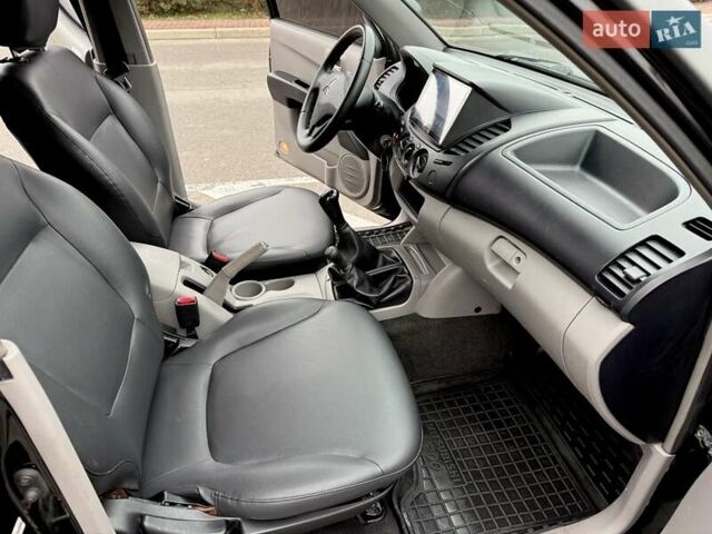 Черный Мицубиси Л 200, объемом двигателя 2.48 л и пробегом 232 тыс. км за 13900 $, фото 39 на Automoto.ua