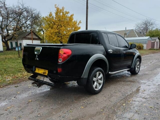 Черный Мицубиси Л 200, объемом двигателя 2.5 л и пробегом 170 тыс. км за 5900 $, фото 7 на Automoto.ua