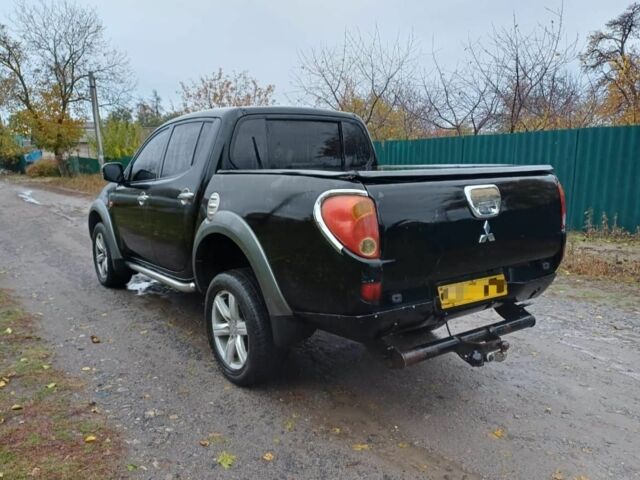 Черный Мицубиси Л 200, объемом двигателя 2.5 л и пробегом 170 тыс. км за 5900 $, фото 6 на Automoto.ua
