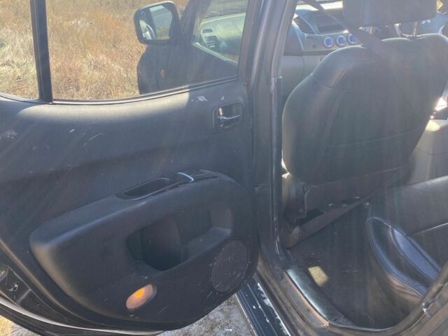 Черный Мицубиси Л 200, объемом двигателя 0 л и пробегом 177 тыс. км за 5500 $, фото 1 на Automoto.ua