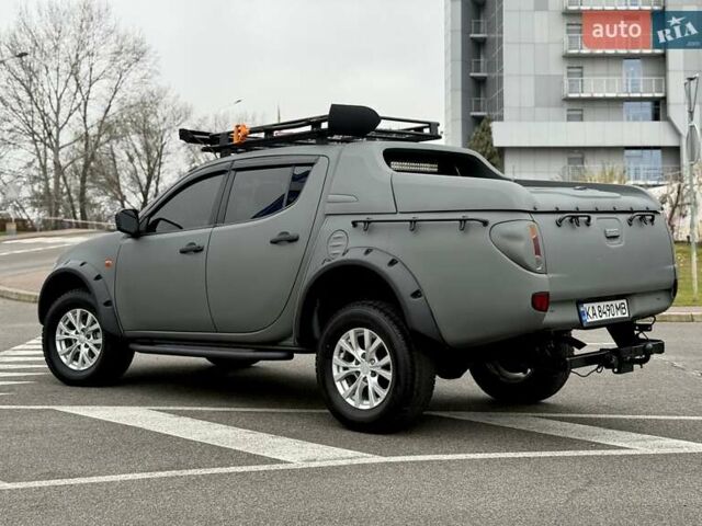 Черный Мицубиси Л 200, объемом двигателя 2.48 л и пробегом 232 тыс. км за 13900 $, фото 8 на Automoto.ua