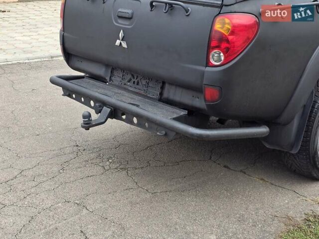 Мицубиси Л 200 2007 в Одессе на Automoto.ua Черный Мицубиси Л 200, объемом двигателя 2.48 л и пробегом 186 тыс. км за 12200 $, фото 10 на Automoto.ua