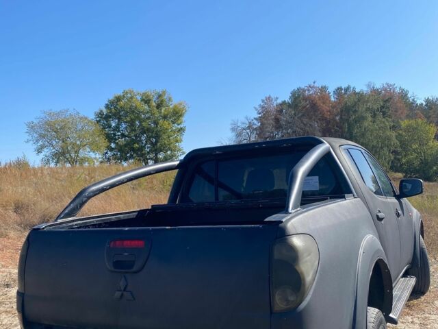 Черный Мицубиси Л 200, объемом двигателя 0 л и пробегом 177 тыс. км за 5500 $, фото 8 на Automoto.ua