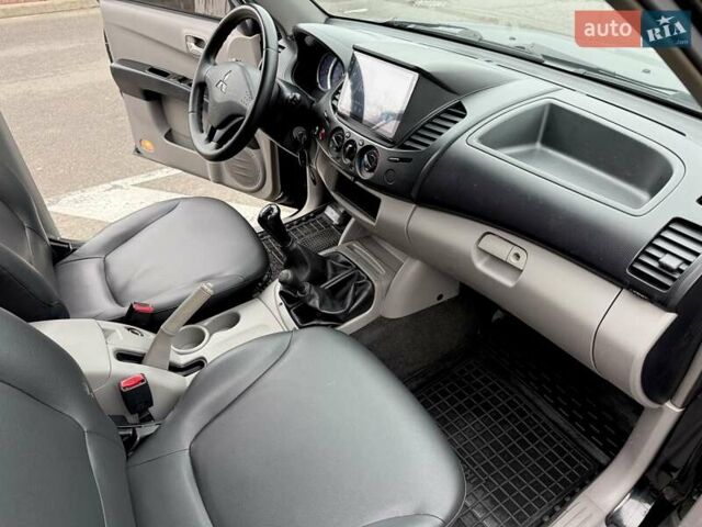 Черный Мицубиси Л 200, объемом двигателя 2.48 л и пробегом 232 тыс. км за 13900 $, фото 41 на Automoto.ua