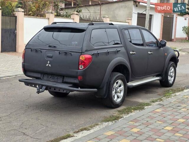 Мицубиси Л 200 2007 в Одессе на Automoto.ua Черный Мицубиси Л 200, объемом двигателя 2.48 л и пробегом 186 тыс. км за 12200 $, фото 5 на Automoto.ua
