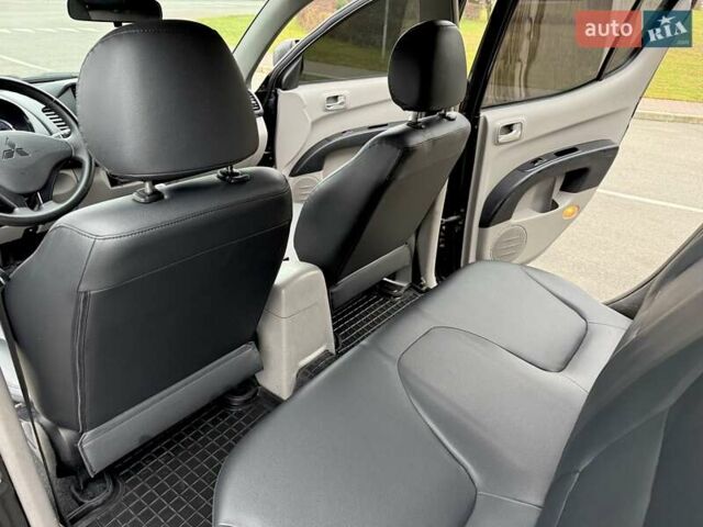 Черный Мицубиси Л 200, объемом двигателя 2.48 л и пробегом 232 тыс. км за 13900 $, фото 53 на Automoto.ua