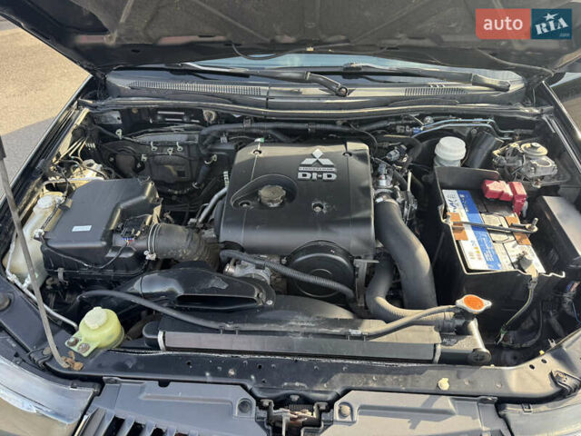 Мицубиси Л 200 2007 в Киеве на Automoto.ua Черный Мицубиси Л 200, объемом двигателя 2.48 л и пробегом 283 тыс. км за 10999 $, фото 33 на Automoto.ua