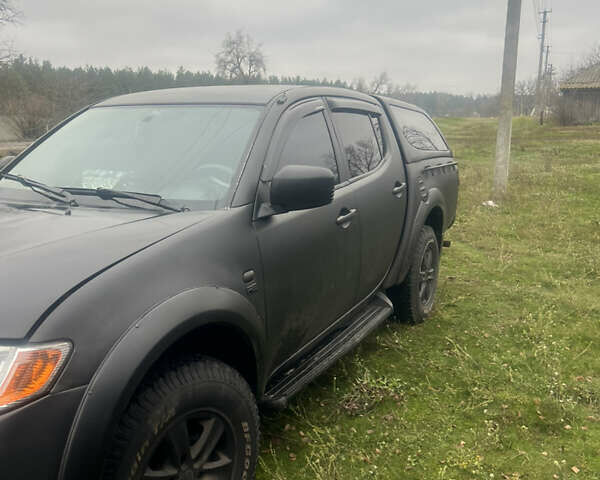 Черный Мицубиси Л 200, объемом двигателя 2.5 л и пробегом 287 тыс. км за 9000 $, фото 3 на Automoto.ua