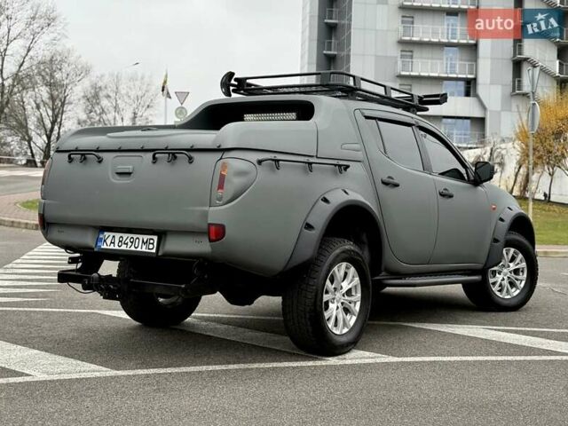 Черный Мицубиси Л 200, объемом двигателя 2.48 л и пробегом 232 тыс. км за 13900 $, фото 15 на Automoto.ua