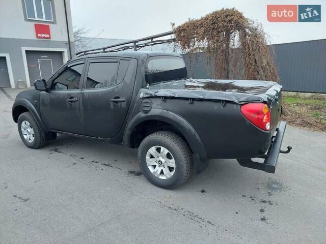 Чорний Міцубісі Л 200, об'ємом двигуна 2.48 л та пробігом 290 тис. км за 9900 $, фото 27 на Automoto.ua