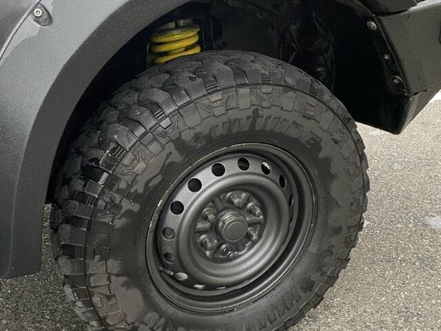 Черный Мицубиси Л 200, объемом двигателя 2.5 л и пробегом 185 тыс. км за 13500 $, фото 5 на Automoto.ua