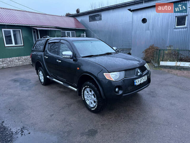 Черный Мицубиси Л 200, объемом двигателя 2.5 л и пробегом 199 тыс. км за 11800 $, фото 16 на Automoto.ua