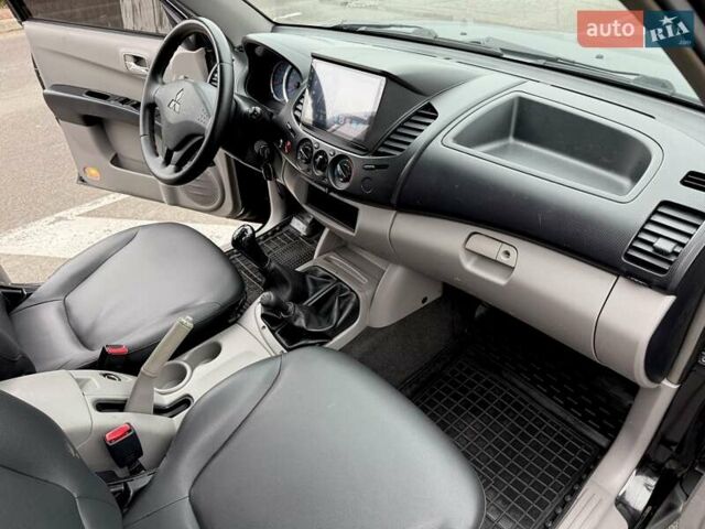 Черный Мицубиси Л 200, объемом двигателя 2.48 л и пробегом 232 тыс. км за 13900 $, фото 42 на Automoto.ua