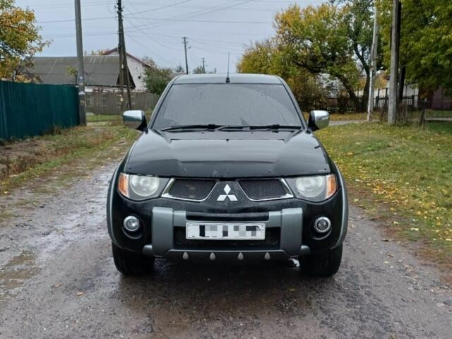 Черный Мицубиси Л 200, объемом двигателя 2.5 л и пробегом 170 тыс. км за 5900 $, фото 2 на Automoto.ua