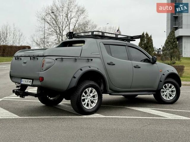 Черный Мицубиси Л 200, объемом двигателя 2.48 л и пробегом 232 тыс. км за 13900 $, фото 17 на Automoto.ua