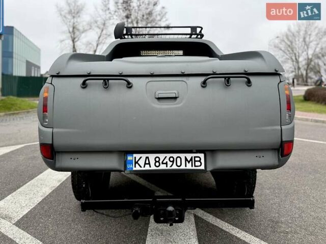 Черный Мицубиси Л 200, объемом двигателя 2.48 л и пробегом 232 тыс. км за 13900 $, фото 12 на Automoto.ua