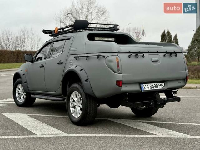 Черный Мицубиси Л 200, объемом двигателя 2.48 л и пробегом 232 тыс. км за 13900 $, фото 10 на Automoto.ua