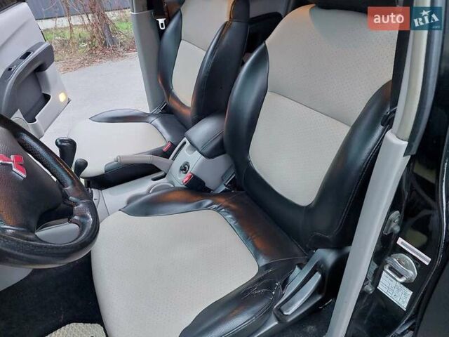 Чорний Міцубісі Л 200, об'ємом двигуна 2.48 л та пробігом 290 тис. км за 9900 $, фото 12 на Automoto.ua