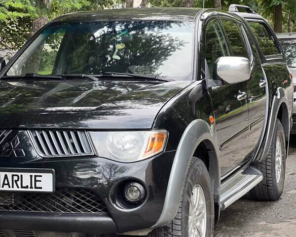 Черный Мицубиси Л 200, объемом двигателя 2.5 л и пробегом 221 тыс. км за 12800 $, фото 21 на Automoto.ua