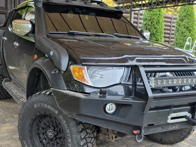 Мицубиси Л 200 2008 в Харькове на Automoto.ua Черный Мицубиси Л 200, объемом двигателя 0 л и пробегом 170 тыс. км за 22000 $, фото 18 на Automoto.ua