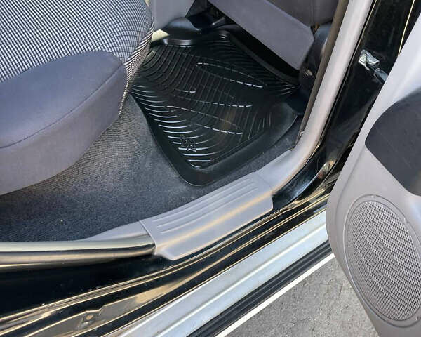 Черный Мицубиси Л 200, объемом двигателя 2.5 л и пробегом 221 тыс. км за 12800 $, фото 19 на Automoto.ua