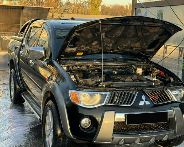 Чорний Міцубісі Л 200, об'ємом двигуна 2.5 л та пробігом 302 тис. км за 10500 $, фото 11 на Automoto.ua