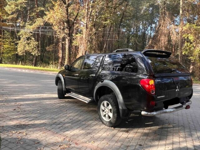 Черный Мицубиси Л 200, объемом двигателя 2.5 л и пробегом 180 тыс. км за 7200 $, фото 2 на Automoto.ua