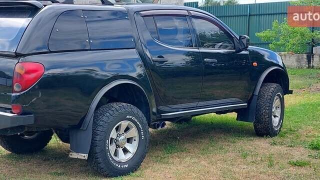 Черный Мицубиси Л 200, объемом двигателя 2.48 л и пробегом 392 тыс. км за 15500 $, фото 5 на Automoto.ua